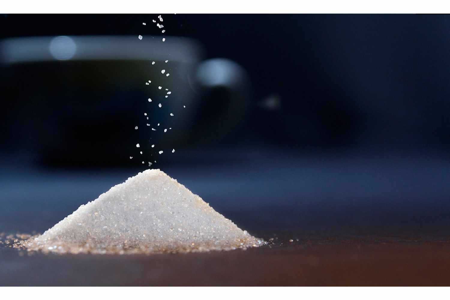 Best Natural Skin Exfoliants + DIY Recipes 4 a pile of raw sugar