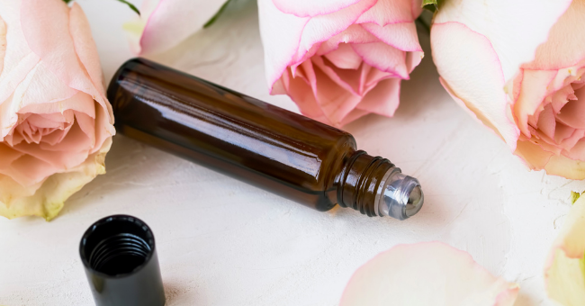 Quick and Easy Homemade Magnesium-Based Deodorant 1 magnesium deodorant in roller bottle with roses